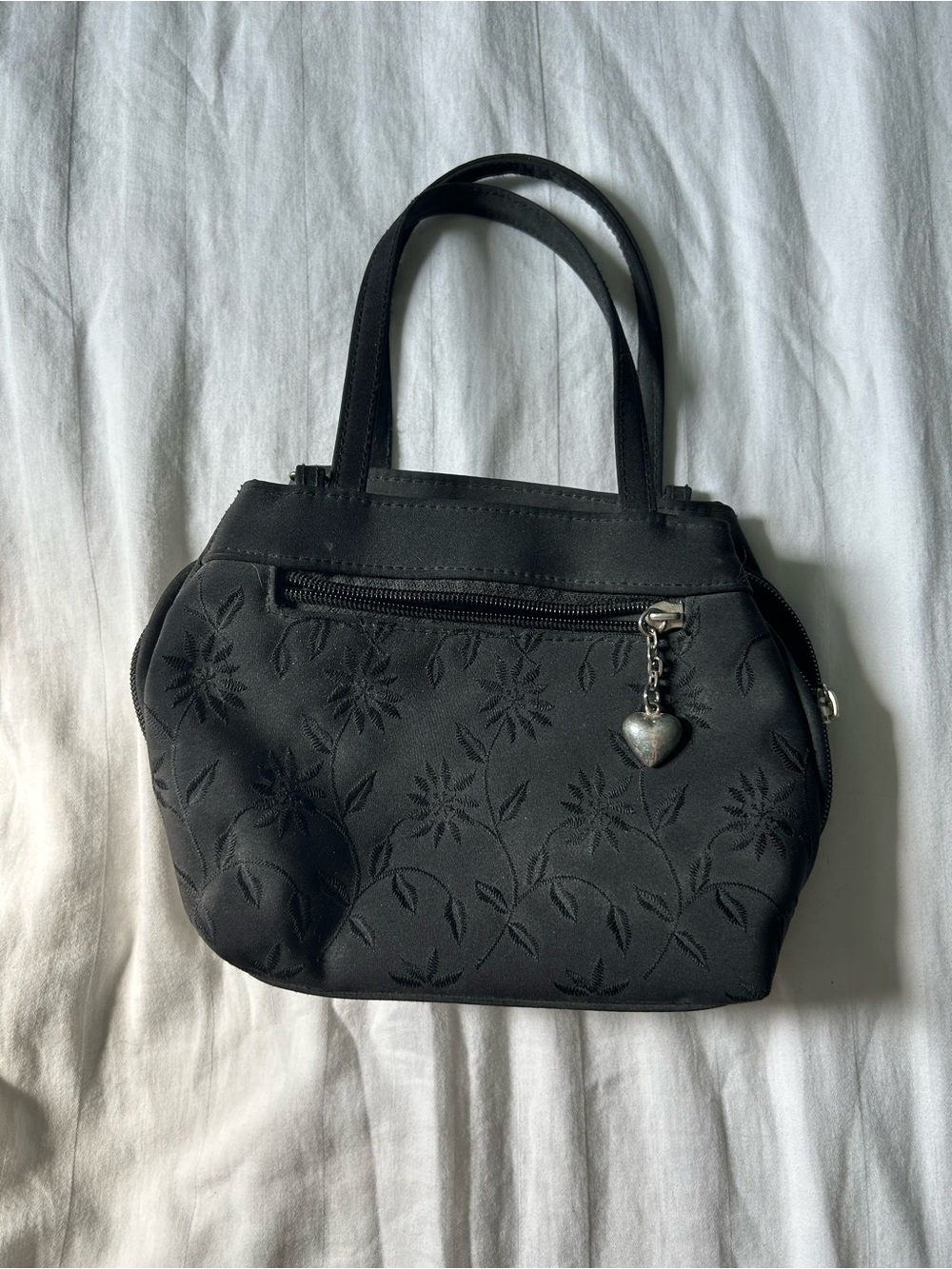 Elegant Black Floral-Embossed Shoulder Bag with Heart Charm